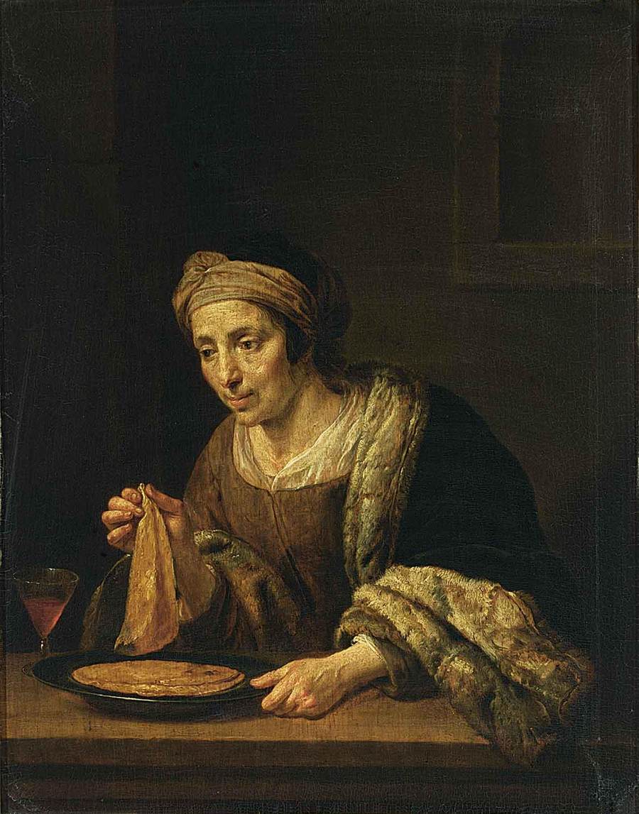 A Woman Holding Pancakes by