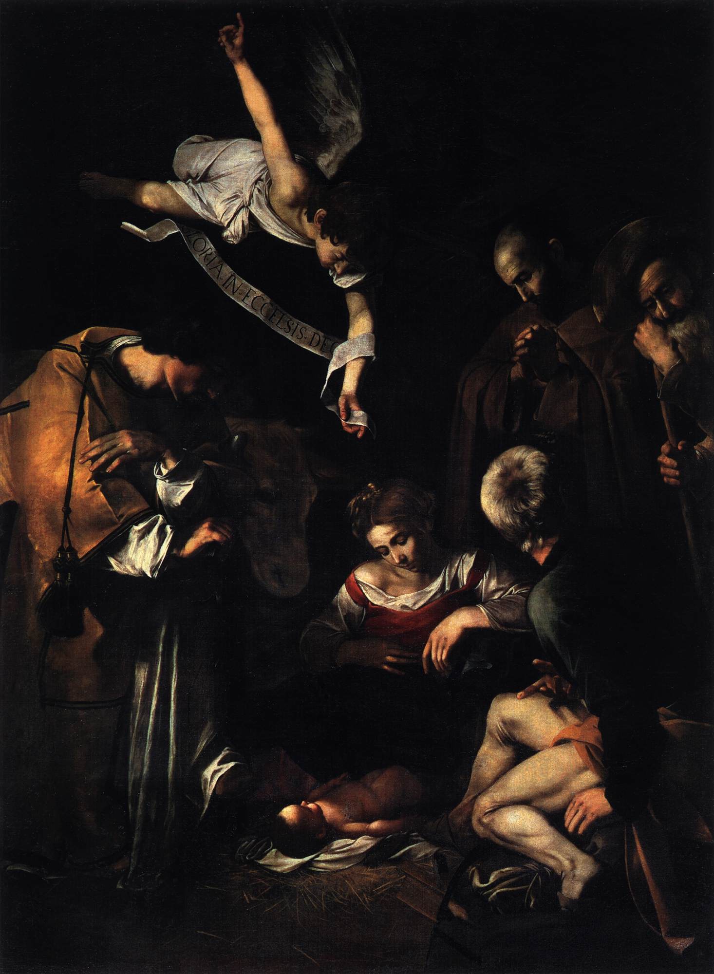 Nativity with St Francis and St Lawrence by CARAVAGGIO