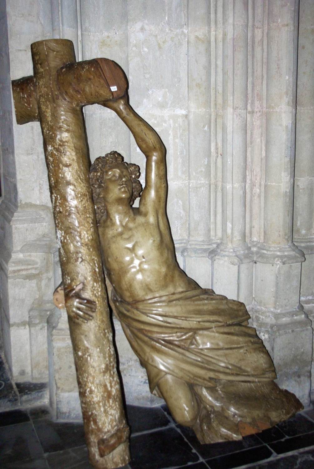 Angel Embracing a Cross by