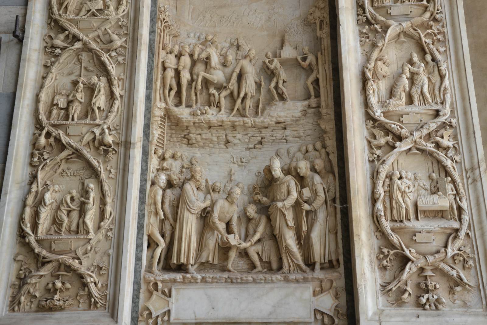 Reliefs on the main portal (detail) by BRIOSCO, Benedetto