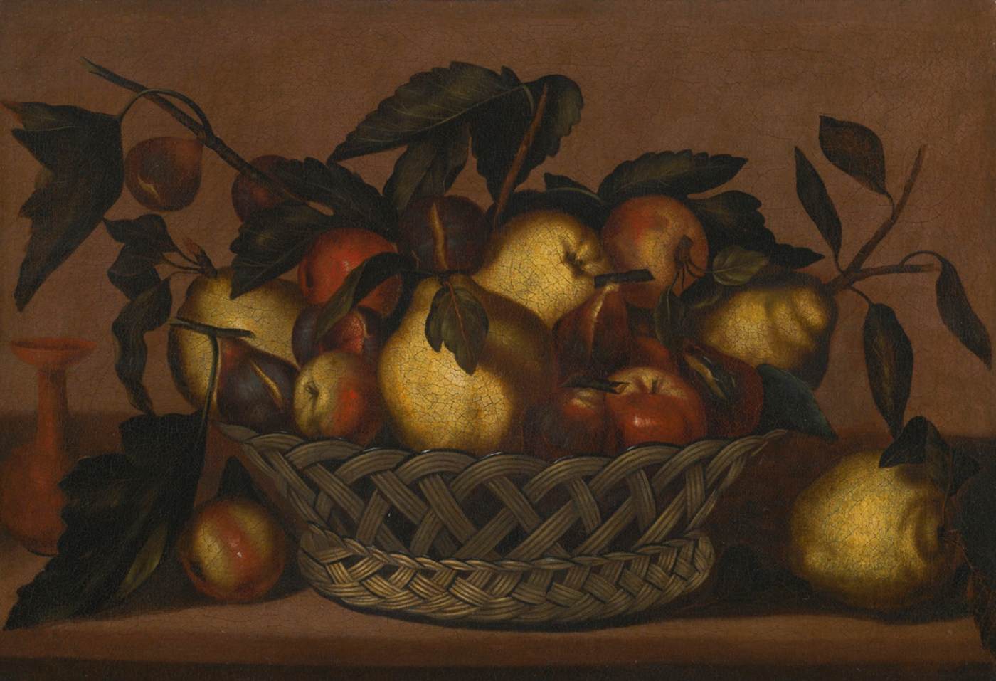 Still-Life of Apples, Pears and Figs in a Wicker Basket on a Stone Ledge by